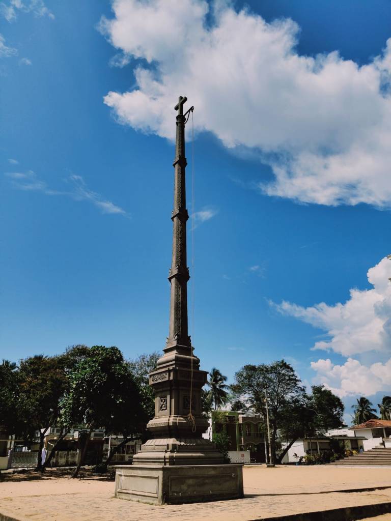 Kodimaram, or the flag staff outside the Vettucaud Church. 